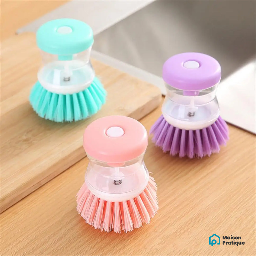 Brosse à vaisselle avec réservoir de produit